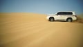 4x4 vehicle driving off road. Stock. Sand dune all-terrain car