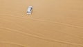 4x4 vehicle driving off road. Stock. Sand dune all-terrain car. Aerial