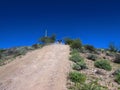 4x4 Vehicle Driving on Steep Dirt Road in Arizona Royalty Free Stock Photo