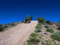 4x4 Vehicle Driving on Steep Dirt Road in Arizona Royalty Free Stock Photo