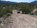 4x4 Vehicle Driving on Steep Dirt Road in Arizona Royalty Free Stock Photo