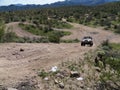 4x4 Vehicle Driving on Steep Dirt Road in Arizona Royalty Free Stock Photo