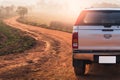 The 4x4 vehicle parking beside of the off-road track in the savanna field. the concept of adventure, travel, vihical, 4x4 and tran