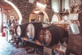 Xalo, Spain - February 3, 2018: Wine barrels in a old wine winery store, Spain