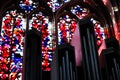 View on organ pipes against colorful bright mosaic windows inside church St. Viktor Dom Royalty Free Stock Photo