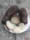 Close up of boiled kimpul food on a small plate.Wooden background.