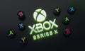 Xbox Series X Logo Glow Around Joystick Button on Dark Background Royalty Free Stock Photo