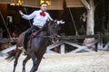 Xcaret, Mexico, December 20, 2022 - Mexican Equestrian with a magnificent exhibition of the Aztec horse running lasso.