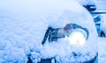 Xenon headlamp through the snow.