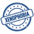 XENOPHOBIA text on blue grungy round rubber stamp