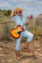 An Xhosa African Cowboy at a farm gate in the country side of South Africa. Royalty Free Stock Photo