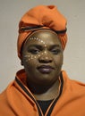 Xhosa woman in orange Royalty Free Stock Photo