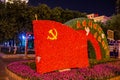 XI'AN, CHINA - AUGUST 2, 2018: Hammer and sickle flag made of flowers in Xi'an, Chi Royalty Free Stock Photo