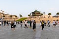 Massive people in sunken park by the historical and ancient Bell Tower of Xi\'an