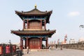 A tower of traditional Chinese style on historical city wall near Yongning or South Gate Royalty Free Stock Photo