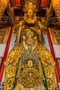 XI'AN, CHINA - AUGUST 5, 2018: Tall Buddha statue in Guangren Lama Temple in Xi'an, Chi
