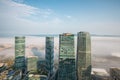 Xiamen cityscapes, aerial view of the city skyline at daytime with advection fog Royalty Free Stock Photo