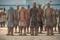 Frontal view on soldiers at excavation in Terracotta Army museum, Xian, China