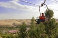 Girl ride the cable car at xiangsha bay, adobe rgb Royalty Free Stock Photo