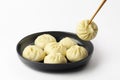 Xiao Long Bao or Baozi, is a type of yeast-leavened meat filled buns, steamed.