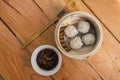 Xiaolongbao, a type of small Chinese steamed bun oe baozi traditionally prepared in a xiaolong, a small bamboo steaming basket Royalty Free Stock Photo