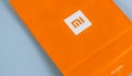 Xiaomi logo on an orange background Royalty Free Stock Photo