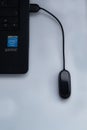 Xiaomi smart band charging connected to a laptop