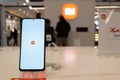 Xiaomi smartphone with Xiaomi logo on screen are shown on retail display in Xiaomi store. Minsk, Belarus - January 26, 2024 Royalty Free Stock Photo