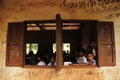 XIENG KHOUANG, LAOS - SEP 09 : Unidentified kids post on camera at school