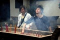 Xindu, China: Burning Incense at Temple