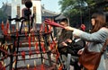 Xindu, China: Lighting Incense Sticks at Temple Royalty Free Stock Photo