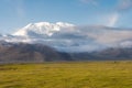 Mustagh Ata Mountain at Karakul Lake in Pamir Mountains, Akto County, Kizilsu Kirghiz Autonomous Prefecture, Xinjiang, China. Royalty Free Stock Photo