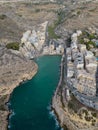 Xlendi bay with town on Gozo Malta aerial high altitude vertical Royalty Free Stock Photo