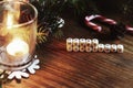 Xmas background tree wood ribbon candle Royalty Free Stock Photo