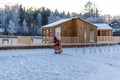 Xmas, cold, December. Santa Claus going with a bag of gifts in the winter on snow-covered field