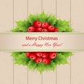 Xmas decoratoions with red holly berries and leaves Royalty Free Stock Photo