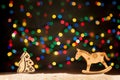 Xmas lights as stars, Christmas tree, horse and copy space for Royalty Free Stock Photo