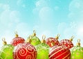 Xmas red and green balls on sky background