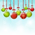 Xmas red and green balls on sky background