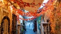 Xmas season street cafe in ioannina city greece lights tables chairs pedestrian street like chessboard