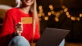 Xmas Shopping. Closeup of female holding debit credit card in hand Royalty Free Stock Photo