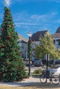 Xmas tree with snowflake and colorful glass ornaments balls at daytime in Coppell, Texas