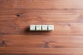 Xmas word on omputer keyboard keys buttons on a wooden background. Xmas concept