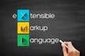 XML - eXtensible Markup Language acronym, technology concept background on blackboard