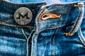 XMR coin instead of buttons on jeans.