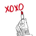 XOXO brush lettering and woman hand holding lipstick on a white background. Vector illustration