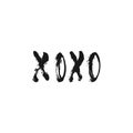 XOXO - hand drawn lettering phrase for Valentines day isolated on the white background. Fun brush ink inscription for Royalty Free Stock Photo