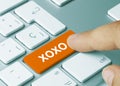 XoXo - Inscription on Orange Keyboard Key