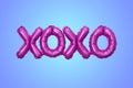 XOXO party balloon on blue Royalty Free Stock Photo