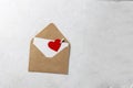Xraft envelope, blank love note with clipped red paper heart Royalty Free Stock Photo